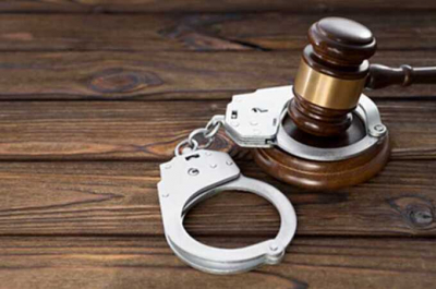 A past judge and former defense official have been accused in a corruption case involving Russia